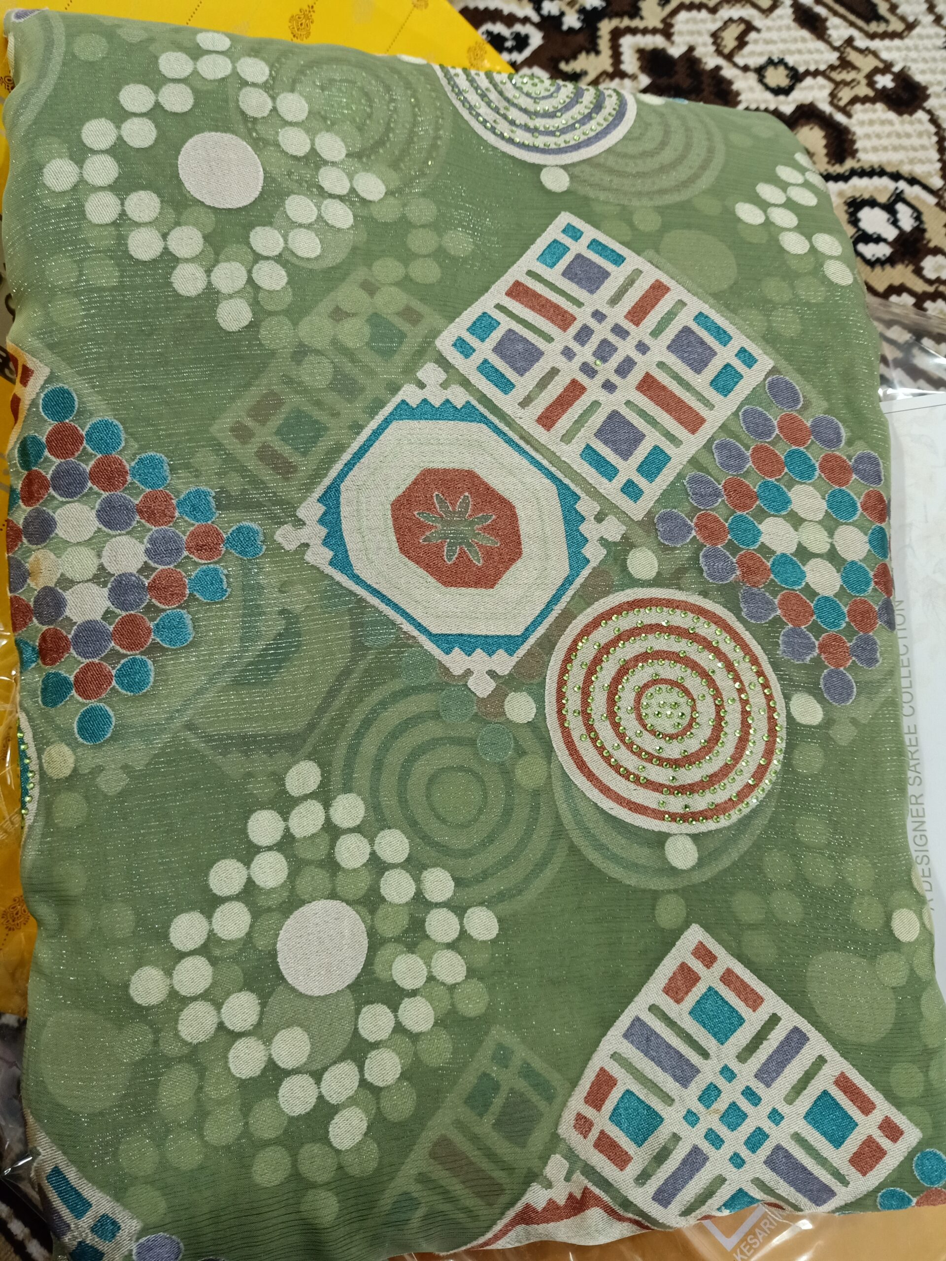 Designer Light Green Tissue Saree with Seroski Work Designer Light Green Tissue Saree with Seroski Work