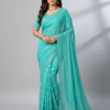 Indian woman model wearing turquoise blue saree in studio photoshoot for e-commerce.
